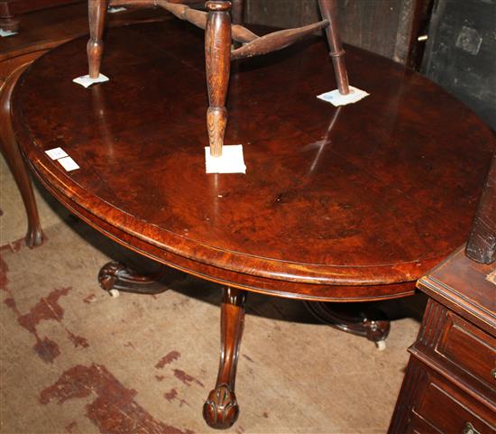 Oval walnut dining table